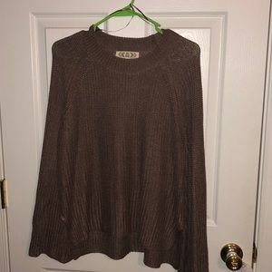 A size large “pink rose” sweater